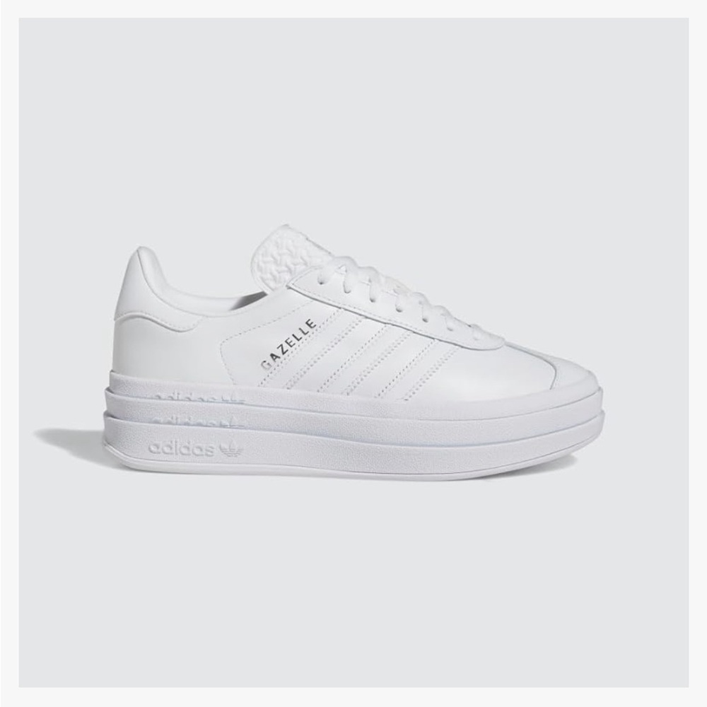 A didas Womens Gazelle Bold Triple White size 7. Worn maybe twice